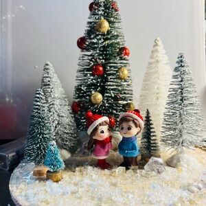 Festive Holiday Figurine Set with Christmas Trees